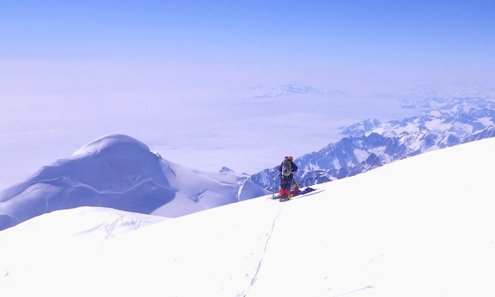 On the summit ridge of Mt. Fairweather with the Pacific Ocean below