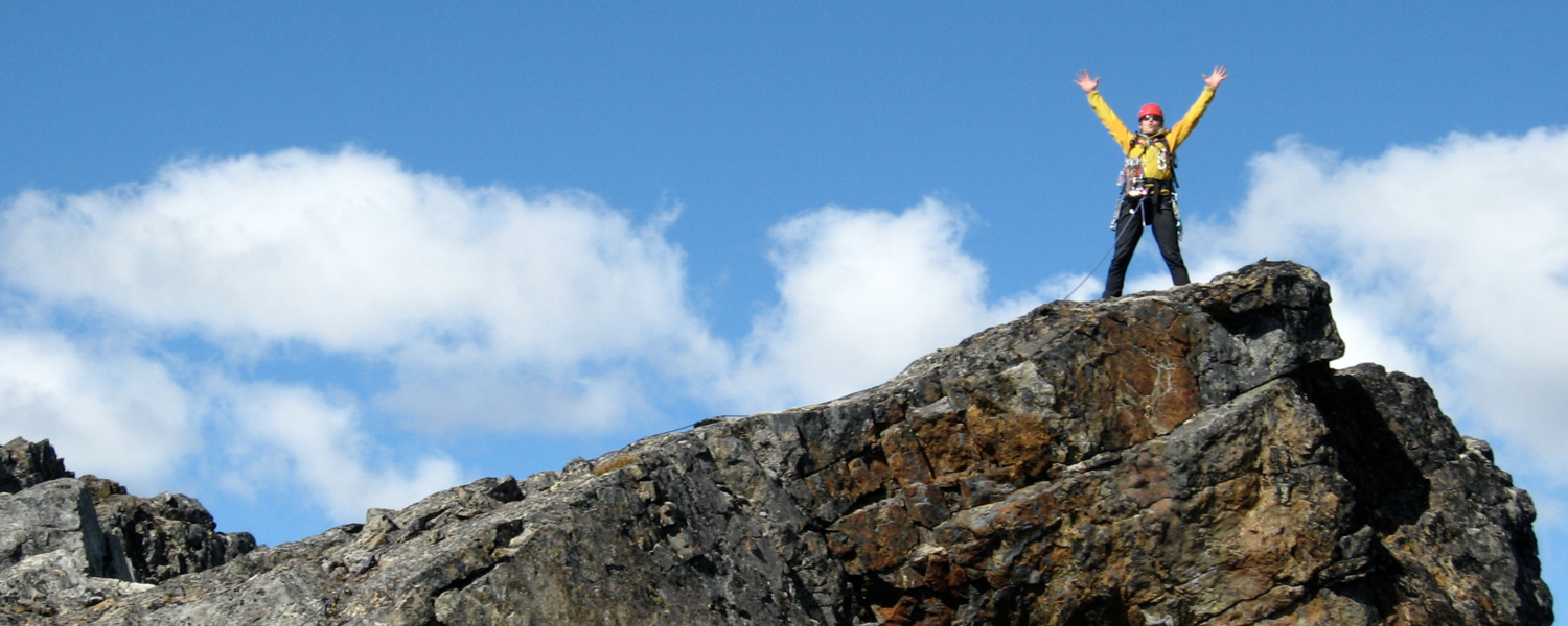 Celebrating the summit north of Skagway near the White Pass
