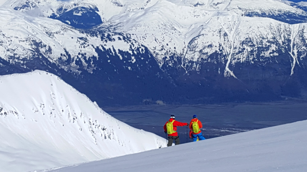 Looking down onto the Chilkat River contemplating the powder turns below